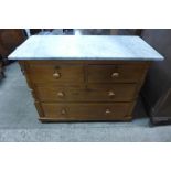 A Victorian pine and marble topped chest of drawers