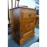 A pine bedside cupboard