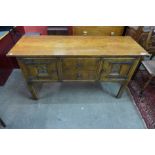 A 17th Century style carved oak dresser