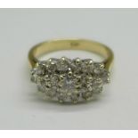 A 9ct gold, oval shaped diamond cluster ring, 4g, N, set with twenty-one diamonds