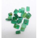 A collection of unmounted emeralds, approximately 8ct total weight