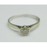 A 9ct white gold and diamond solitaire ring, 1.3g, N
