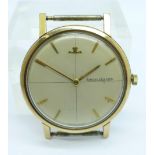 A 9ct gold Jaeger-LeCoultre wristwatch, with Omega winding crown, the case hallmarked London 1959