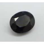 An unmounted sapphire, of over 7carat weight, 12mm x 10mm