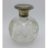 A silver topped globular etched glass scent bottle, Birmingham 1919, with inner stopper, the top