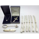 Six silver handled knives, a silver bladed fruit knife, a silver footprints cross and chain, a