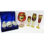 Four items of Murano/Venetian glass, a gilded brandy glass and three similar wines with gilded stems