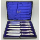 A set of six silver handled knives, boxed