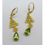 A pair of silver gilt, peridot and zircon pendant earrings