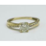 A 9ct gold solitaire diamond ring, 0.5carat weight, 1.3g, M