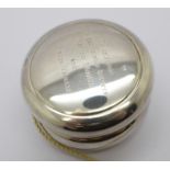 A hallmarked silver yo-yo, with inscription, diameter 57mm