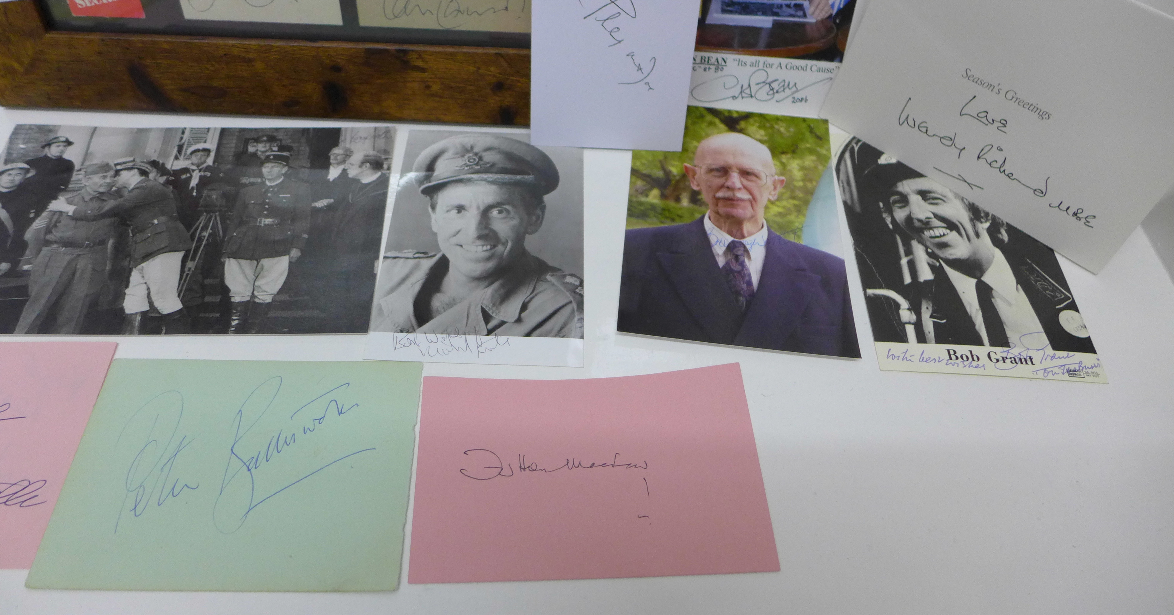 A framed Dad's Army montage of signed photographs with autographs and cast photographs plus a - Image 4 of 6