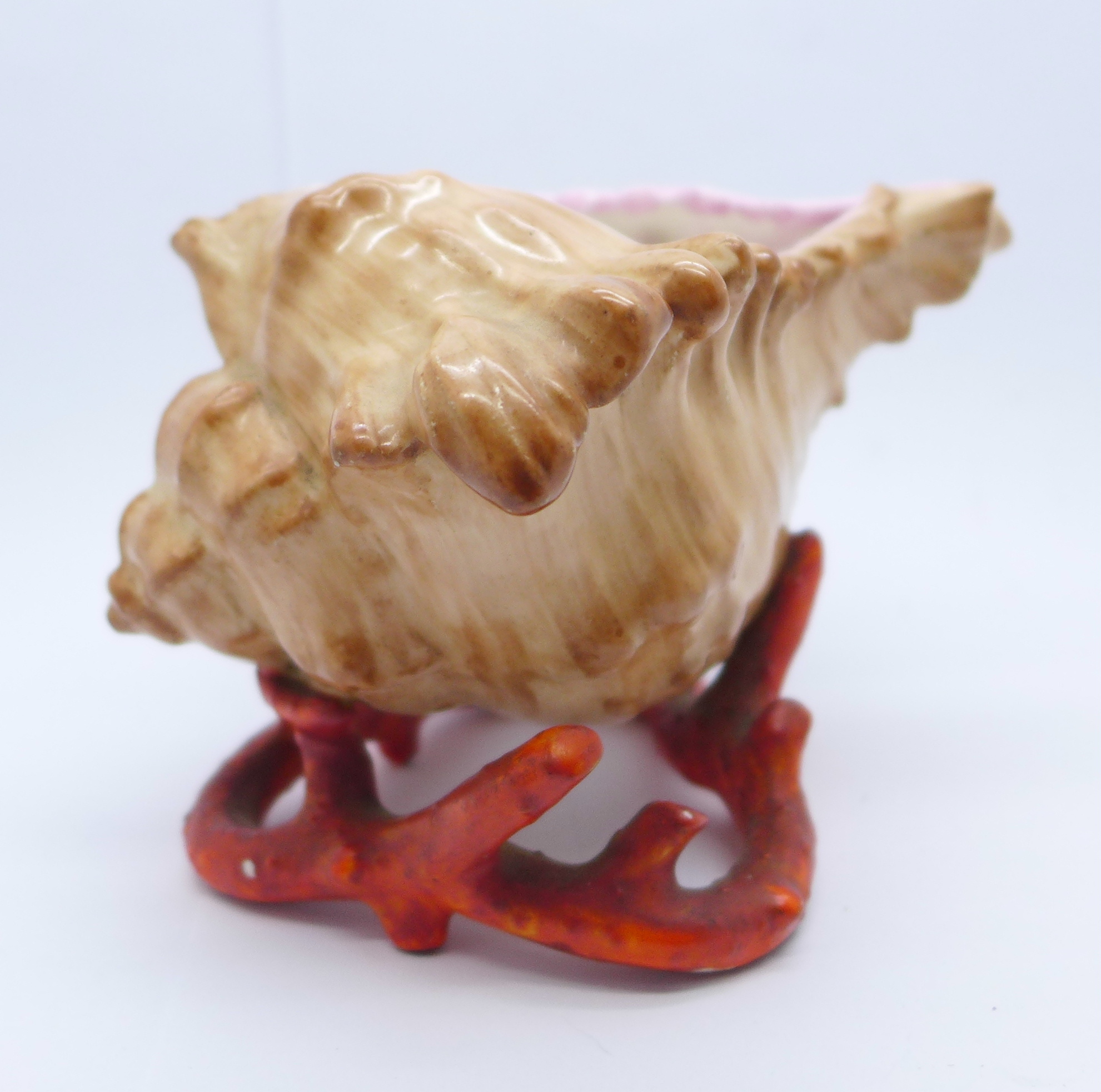 An early Copeland shell with coral vase, paint losses to coral base, 8.5cm