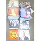 Two boxes of 7" vinyl singles, 1980's pop music