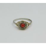 A c1900 yellow metal, coral and diamond cluster ring, with later replacement white metal shank