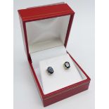 A pair of 9ct gold and sapphire stud earrings, 5mm x 7mm