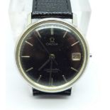 An Omega Seamaster De Ville wristwatch with black dial and date, lacking winding crown, 32mm case