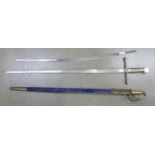 A re-enactment sword, one other sword and a sword blade