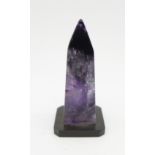 A Blue John obelisk set on slate, height 49mm