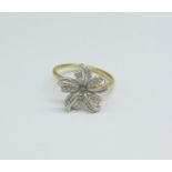 A silver gilt floral ring with central diamond accent, M