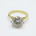 An 18ct gold and moissanite solitaire ring, 3.5g, J, (stone 8 to 9mm)