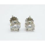 A pair of platinum set diamond ear studs, each stone approximately 0.75ct weight