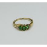 A 9ct gold, green tourmaline and diamond ring, 2.4g, P