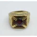 A 9ct gold and garnet ring, 6.5g, I