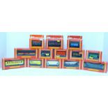 Thirteen Hornby Railways 00 gauge model wagons, coaches and vans, boxed