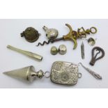 A silver button hook, a hallmarked silver perfume funnel, a/f, a corkscrew, a coin holder, etc.