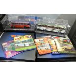 A collection of twenty boxed Atlas Editions Classic Coaches Collection model coaches, with a set