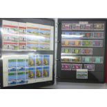 Unmounted mint Channel Islands stamps in album includes sheets, gutter panel, postage dues, etc.,