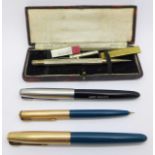 A cased silver Fyne Poynt pencil, two Parker fountain pens and a Parker propelling pencil