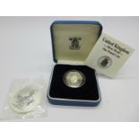 A 1998 One Ounce Fine Silver Britannia £2 coin and a Royal Mint 1988 UK Silver Proof One Pound Coin,