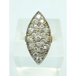 An 18ct yellow gold, marquise shaped diamond ring, set with twenty-three diamonds, approximately 3ct