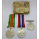 Three WWII medals;-two War Medals and one The Defence Medal