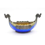 A Norwegian silver and blue enamel Viking ship salt, 8.5cm