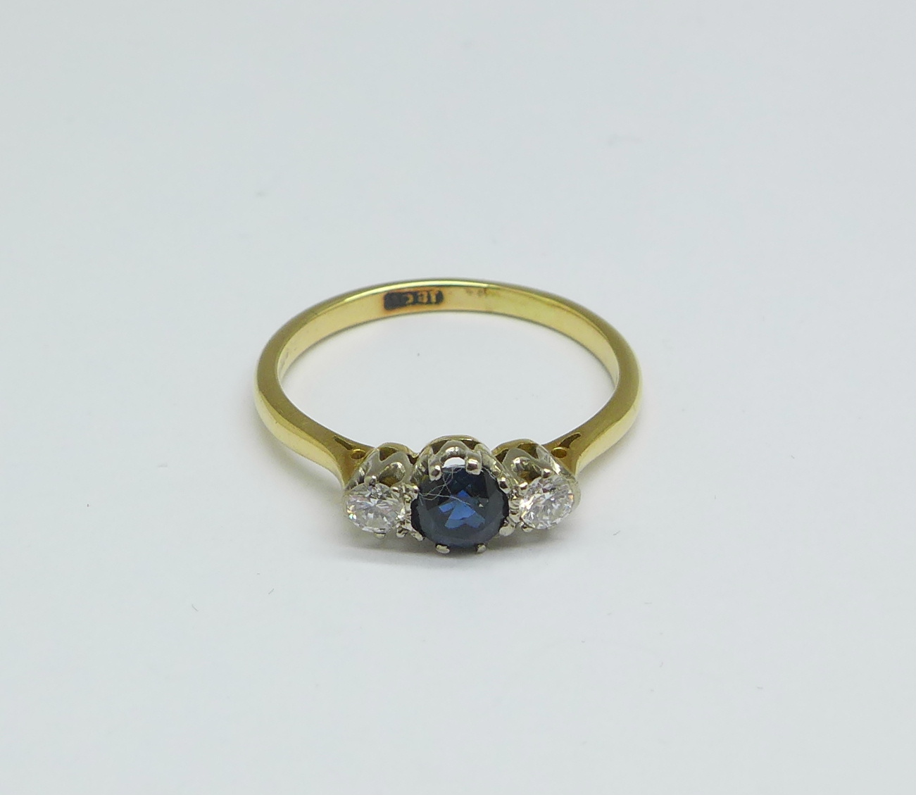 An 18ct gold, sapphire and diamond ring, 2.8g, P