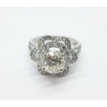 An 18ct white gold and diamond ring, the principal stone 1.63ct diamond weight, colour K, clarity