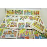 Seventy-seven reproduction humorous seaside postcards