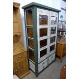 A French style painted two door bookcase