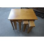 A teak nest of tables