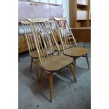A set of four Ercol Blonde beech and elm Goldsmith chairs