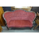 An early 20th Century French upholstered mahogany sofa, a/f