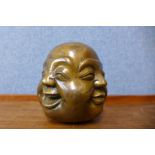 A small oriental bronze four faced Buddha, 12cms h
