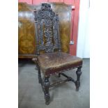 A 17th Century carved oak side chair, 120cms h