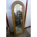 A pine arch framed mirror