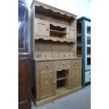 A Victorian style pine dresser, 197cms h, 122cms w, 43cms d