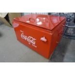 A Coca-Cola metal cooling box