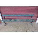 A cast iron railway platform bench, 76cms h x 237cms w